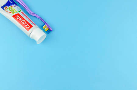 Puchong, Malaysia - July 16, 2019; Colgate toothpaste on blue background. Brand of produced by...