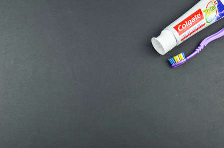 Puchong, Malaysia - July 17, 2019; Colgate toothpaste on black background. Brand of produced by Colgate-Palmolive.のeditorial素材