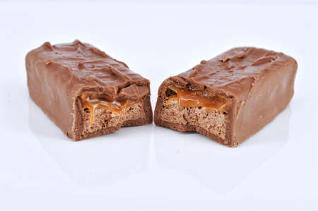 Closeup of chocolate bar on white background.Selective focus.の写真素材