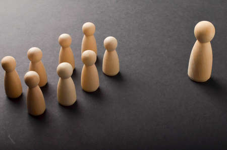 Business & HR global wood puzzle concept for leadership and team with peg dollの写真素材