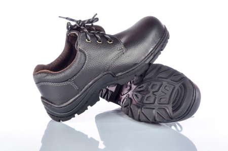 Modern working boots isolated on white background.の写真素材