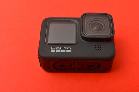 Kuala Lumpur, Malaysia - April 30, 2021: New flagship action camera gopro 9 black on red background....