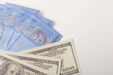 Multiple banknote in close up shoot. Malaysia ringgit with dolar. Selective focus.