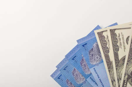 Multiple banknote in close up shoot. Malaysia ringgit with dolar. Selective focus.