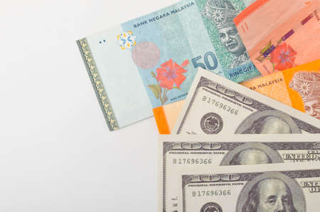 Multiple banknote in close up shoot. Malaysia ringgit with dolar. Selective focus.