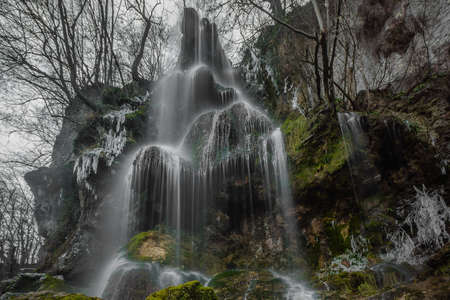 Germany waterfall water stream with ice and frostの写真素材