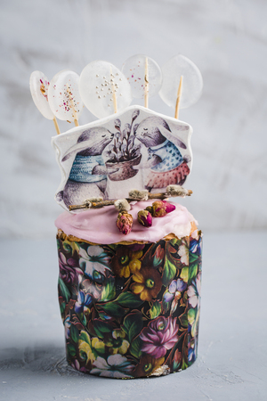 Easter composition with orthodox sweet bread, kulich and eggs on light background. Easter holidays...