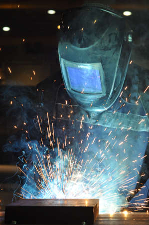 electric welder brews steel at the factory