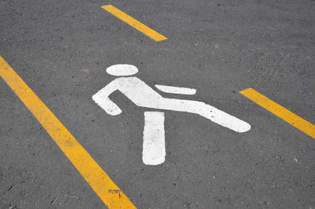 Crosswalk. Road marking in the form of a human figureの写真素材