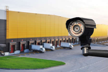 closed circuit camera Multi-angle CCTV system against the background of a modern warehouse complex. The concept of protection of goods.の写真素材