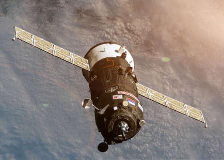 The Progress spacecraft is piloted by astronauts in orbit of planet Earth. Space.の写真素材