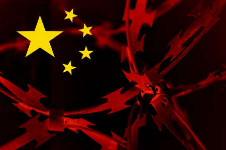Abstract image of the national flag of China with twisted barbed wire.の写真素材
