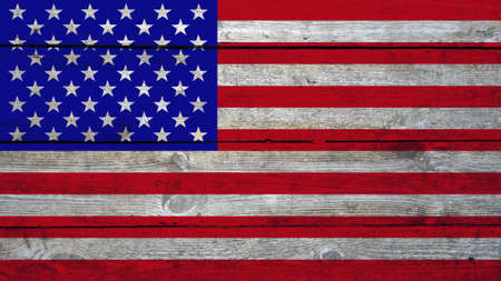 The contours of the American flag on a cracked old wooden wall - flat textureの写真素材