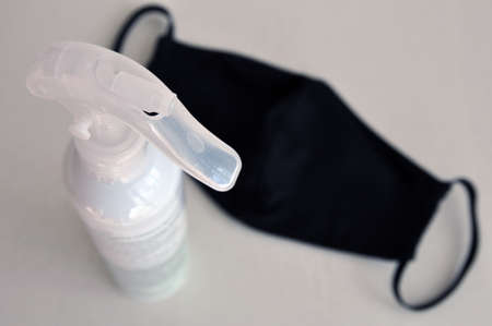 Coronavirus prophylaxis, nebulizer with disinfectant and mask are in black out of focus. Means for...