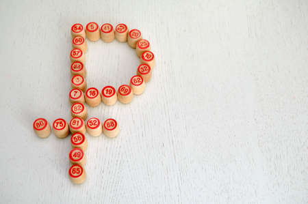 Wooden bingo barrels forming of the Russian ruble.