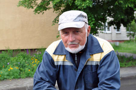 Portrait of an intelligent bearded man in a cap
