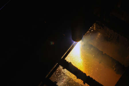 metal cutting process using plasma cutting machine. Industrial