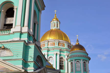 Domes of the Orthodox Church with crosses against the blue sky. Orthodox Russia