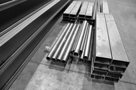 Steel profiled pipe at a metalwork plant. Blanks for the manufacture of structures in the workshop.