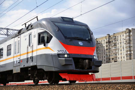 April 18, 2021 - Moscow, Russia: Modern high-speed passenger rail transport. Suburban electric trainのeditorial素材