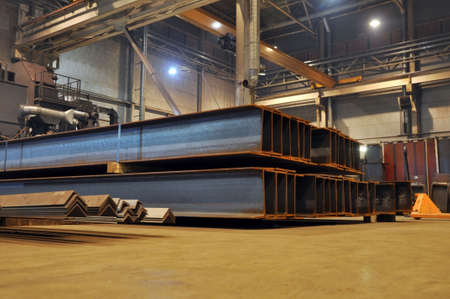 Storage of rolled metal in a warehouse.
