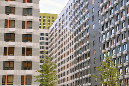 Moscow, Russia - August 5, 2021: Facades of buildings of a new residential complex. Contemporary...