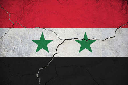 An image of the Syrian Arab Republic flag on a wall with a crack. Background.