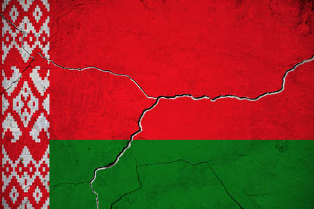 An image of the Belarus flag on a wall with a crack.の写真素材