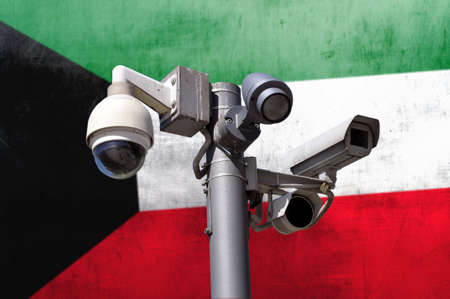 Closed circuit camera Multi-angle CCTV system against the background of the national flag of Kuwait....