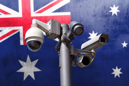 Closed circuit camera Multi-angle CCTV system against the background of the national flag of Australia. total control.の写真素材
