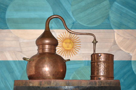 Copper alambik on the background of the national flag of Argentina. Winemaking.の写真素材
