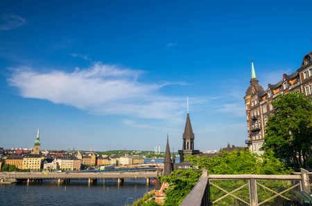 Aerial view of Mariahissen, Centralbron bridge over Lake Malaren water and old historical town quarter Gamla Stan of Stadsholmen from Monteliusvagen lookout point Sodermalm island, Stockholm, Swedenの写真素材
