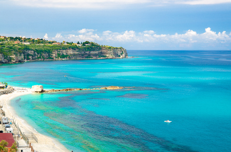 Top view of beautiful amazing Tyrrhenian sea with turquoise water, tropical seascape, endless horizon, Costa degli Dei, Coast of the Gods, Tropea, Calabria, Southern Italyの写真素材