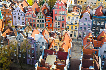 Aerial view of old historical town centre with typical colorful multicolored facades of houses buildings, tiled roofs from view platform of Basilica St Marys church cathedral, Gdansk, Polandのeditorial素材