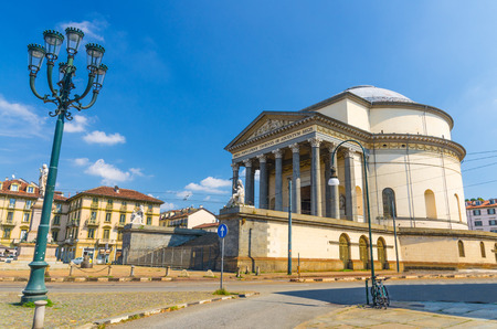 Catholic Parish Church Chiesa Gran Madre Di Dio neoclassic style building and Vittorio Emanuele monument on square piazza with street lights in historical centre of Turin Torino city, Piedmont, Italyの写真素材