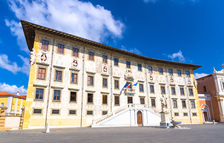 Palazzo della Carovana palace on Piazza dei Cavalieri Knightsâ square in historical centre of Pisa town with blue sky white clouds background in sunny day, Tuscany, Italyのeditorial素材