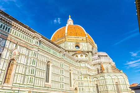 Dome of Florence Duomo, Cattedrale di Santa Maria del Fiore, Basilica of Saint Mary of the Flower Cathedral in sunny day with clear blue sky, Tuscany, Italyの写真素材