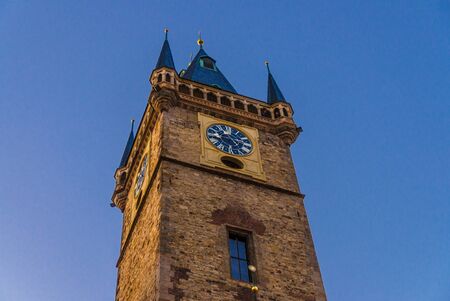 Clear blue sky of Prague, Main tower of the Old Town Hall, City Hall is made in Gothic Style, Prague chimes, observation deck of The Old Town Square (Stare Mesto), Bohemia, Czech Republicの写真素材