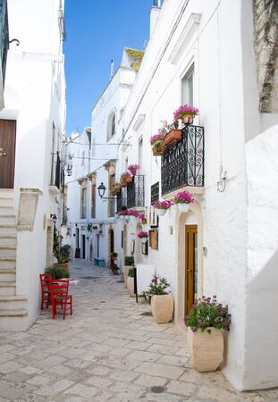 Narrow white streets of Locorotondo in Puglia (Apulia) region, southern Italyの写真素材