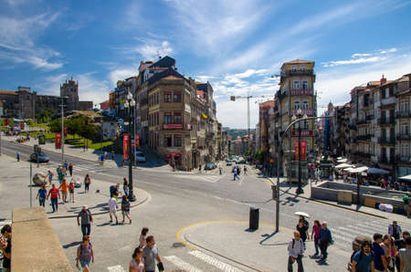 Porto, Portugal - June 23, 2017: People are walking on the streets in the city centre near Sao Bento station during the city dayのeditorial素材