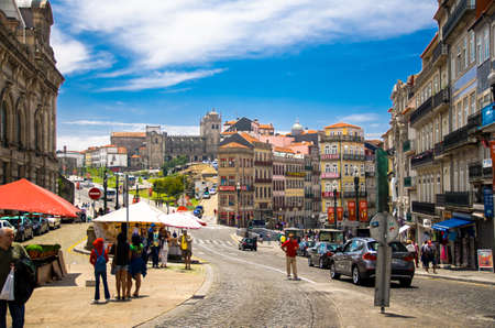 Porto, Portugal - June 25, 2017: People are walking on the streets in the city centre near Sao Bento station during the city dayのeditorial素材