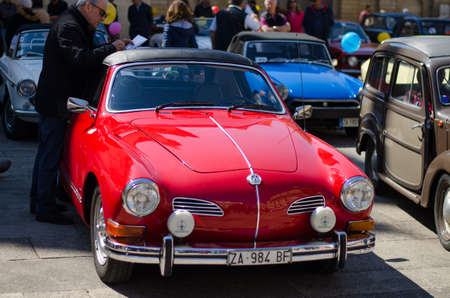 Lecce, Italy - April 23, 2017: Colourful vintage classic retro automobiles car Volkswagen parked at the central square Piazza del Duomo during exhibition, Puglia Apulia region, Southern Italyのeditorial素材
