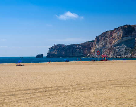 Nazare, Portugal, June 22, 2017: View of the beach and lighthouse on the cliffのeditorial素材