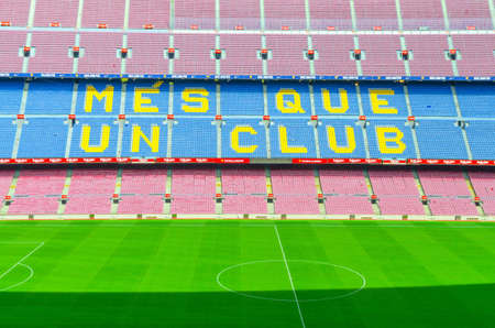 Barcelona, Spain, March 14, 2019: Camp Nou is the home stadium of football club Barcelona, the largest stadium in Spain. Top aerial view of tribunes stands and green grass field.のeditorial素材