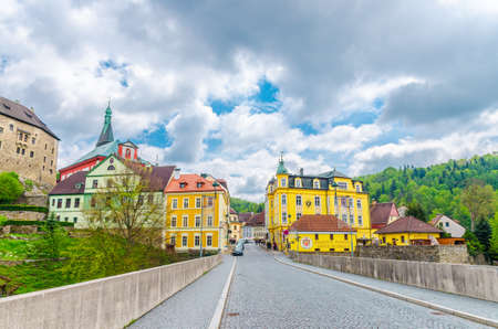 Loket, Czech Republic, May 12, 2019: bridge over Eger river, town with Loket Castle Hrad Loket gothic style on massive rock and colorful buildings, Karlovy Vary Region, West Bohemiaのeditorial素材