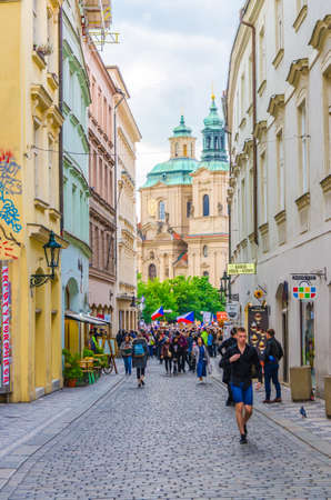 Prague, Czech Republic, May 13, 2019: Czechs people with flags at demonstration protest against Prime Minister Andrej Babis on Old Town Square Stare Mesto in historical city centreのeditorial素材