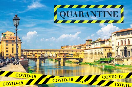 Quarantine in Italy. Ponte Vecchio stone bridge Arno River in Florence city. No travel and lockdown concept. Coronavirus outbreak Covid-19 pandemic concept. Canceled tourist vacation. Barrier tape.の写真素材