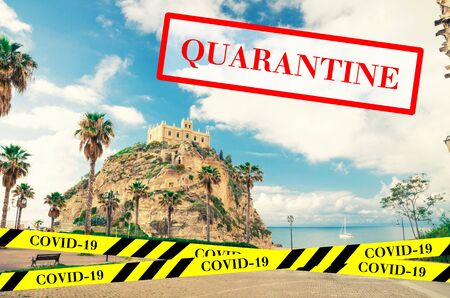 Quarantine in Italy. Tropea town, church Santa Maria dell Isola on top of rock. No travel and lockdown concept. Coronavirus outbreak Covid-19 pandemic concept. Canceled tourist vacation. Barrier tape.の写真素材