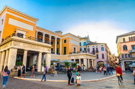 Padua, Italy, September 12, 2019: Museo del Risorgimento museum building on Piazzetta Cappellato Pedrocchi square in historical city centre of Padova, women talking, people walking, Veneto Regionのeditorial素材