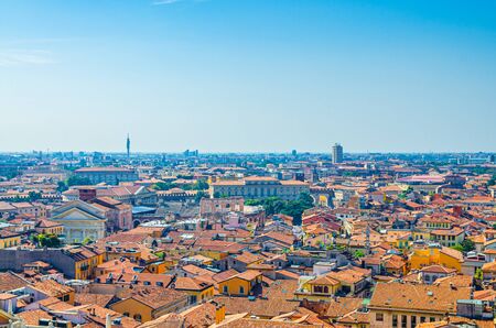 Aerial view of Verona city historical centre Citta Antica with red tiled roof buildings. Panoramic view of cityscape of Verona town. Blue sky background copy space. Veneto Region, Northern Italyの写真素材
